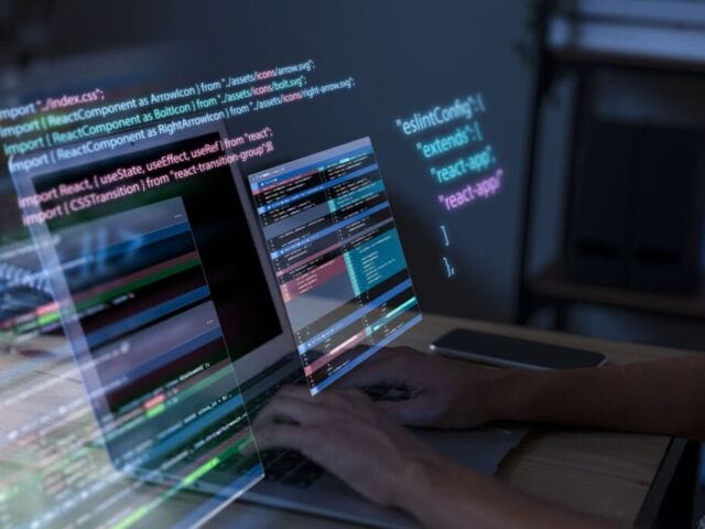 This image has an empty alt attribute; its file name is programming-background-with-person-working-with-codes-computer-1024x683.jpg