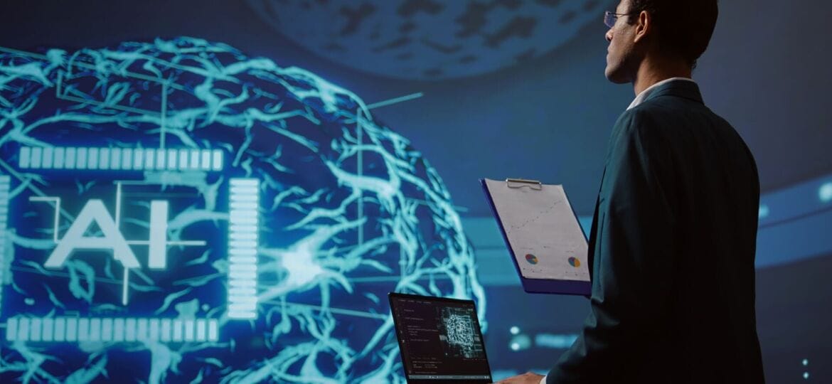 Startup employee looking over business charts using AI software
