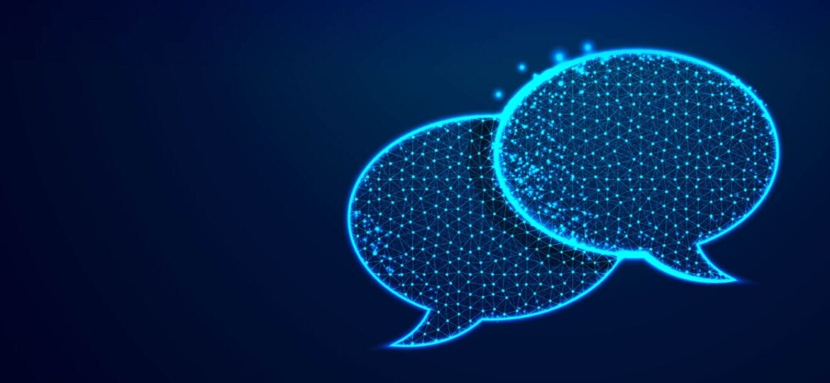 Dialogue Chat clouds Speech bubble icon from lines triangles and particle style design Low poly technology devices people communication concept on blue background
