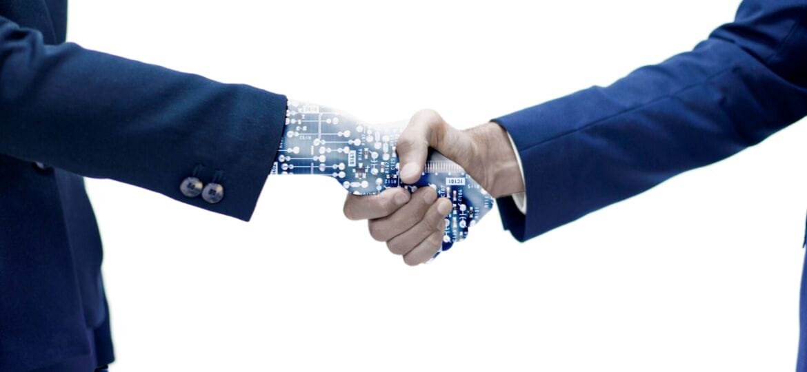 man-shaking-hand-with-robotic-arm