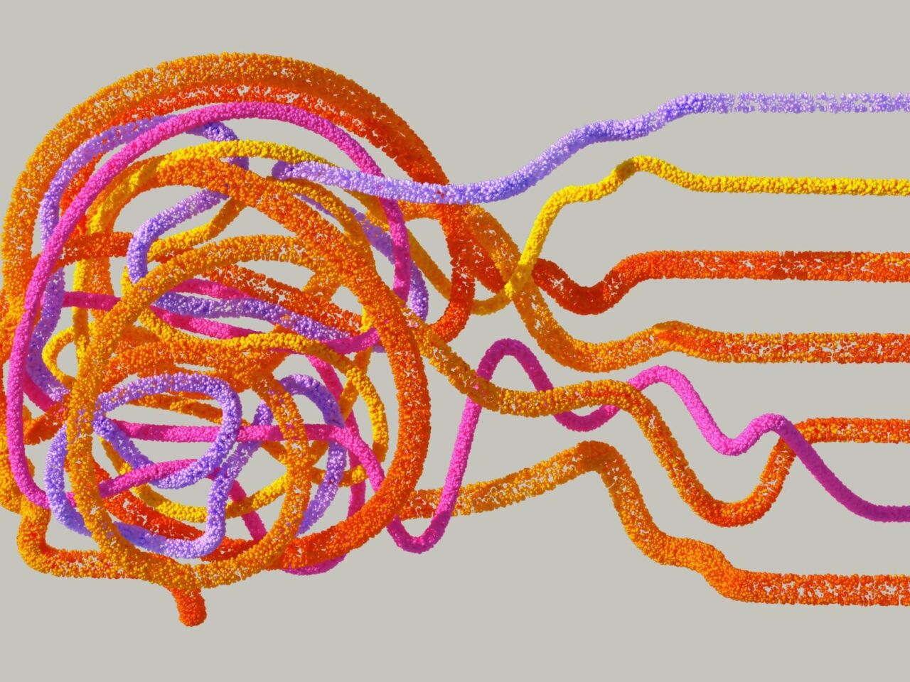 Colorful orange, pink, purple, and yellow strings tangle together to make the shape of a human mind. (Photo by Google DeepMInd).