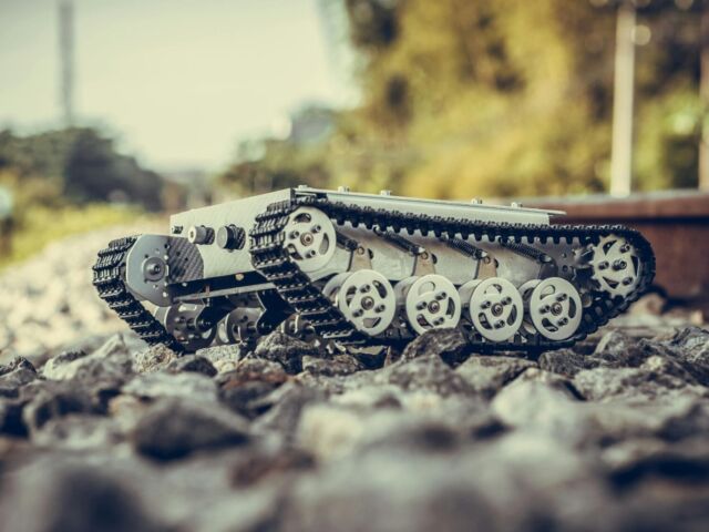 A piece of construction equipment sits on a railroad. (Photo by David Thai).